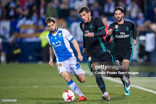 Theo Hernandez of Real Madrid battles for the ball with Darko Brasanac of CD Leganes during the Copa del Rey 2017-18 match between CD Leganes and...