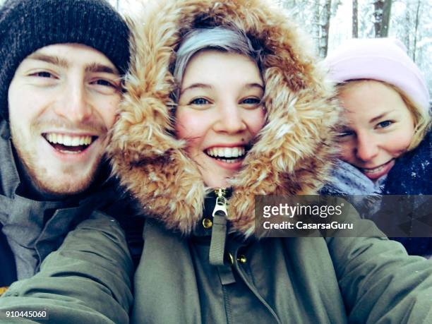 young adults taking a selfie in tempere, finland - finland stock pictures, royalty-free photos & images