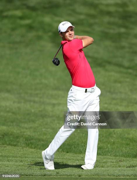 Martin Kaymer of Germany plays his second shot on the par 5, 10th hole during the second round of the Omega Dubai Desert Classic on the Majlis Course...