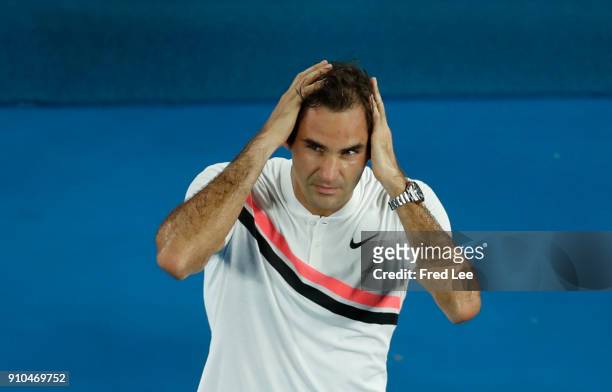 Roger Federer of Switzerland waves to the crowd after winning his semi-final match against Hyeon Chung of South Korea on day 12 of the 2018...