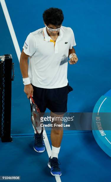 Dejected Hyeon Chung of South Korea waves to the crowd after retiring injured due to a blistered foot in his semi-final match against Roger Federer...