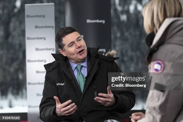 Paschal Donohoe, Ireland's finance minister, gestures as he speaks during a Bloomberg Television interview on the closing day of the World Economic...