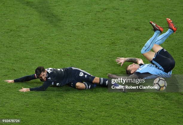 Christian Theoharous of the Victory challenges Luke Wilkshire of Sydney FC during the round 18 A-League match between Melbourne Victory and Sydney FC...