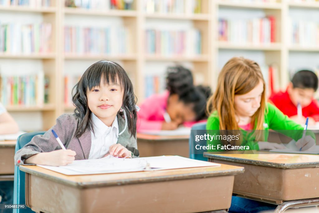 Learning To Write Together High-Res Stock Photo - Getty Images