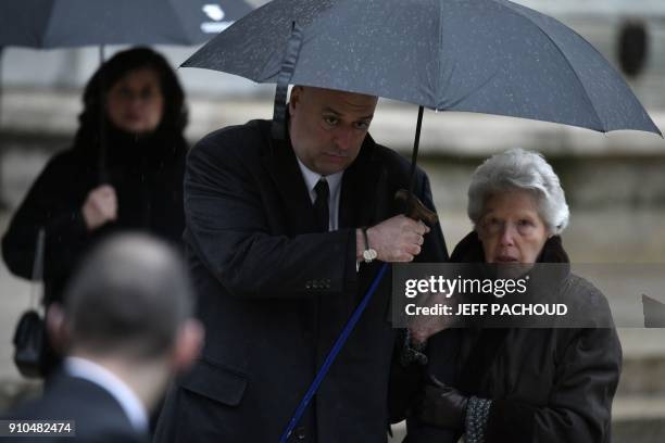 Son-in-law of late French chef Paul Bocuse Philippe Bernachon and French chef Paul Bocuse's widow Raymonde leave the Saint-Jean Cathedral in Lyon at...