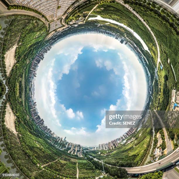spinning little planet - tiny planet stock pictures, royalty-free photos & images