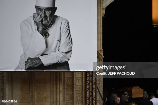 Pallbearers carry the coffin French chef Paul Bocuse at the end of the funeral ceremony held at the Saint-Jean Cathedral in Lyon on January 26, 2018....