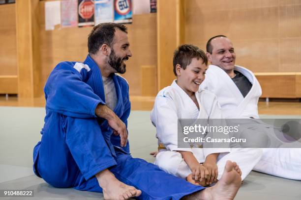 group of people in kimono relaxing and socializing - teachers pet stock pictures, royalty-free photos & images