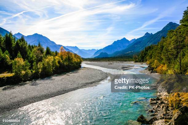 lechriver at autumn, near forchach, lechtaler alps, tirol, austria - austria stock pictures, royalty-free photos & images
