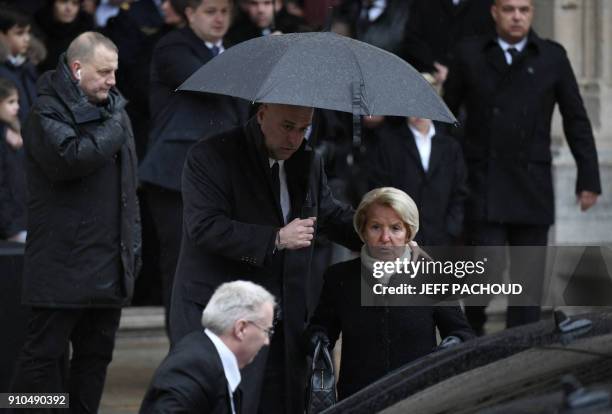 Son-in-law of late French chef Paul Bocuse Philippe Bernachon and his mother Raymone Carlut leave after attending the funeral ceremony for French...
