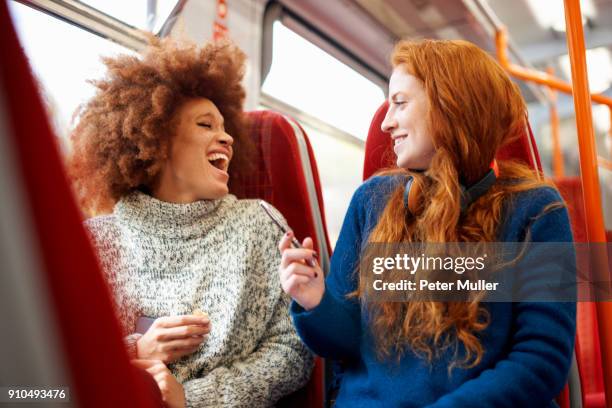 friends on train, london - city break friends stock pictures, royalty-free photos & images