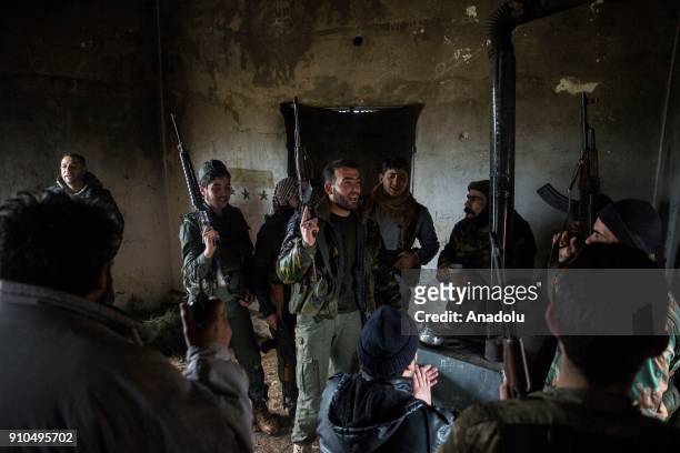 Members of Free Syrian Army , backed by Turkish Army, chant revolutionary songs in a building in Azez region of Aleppo, Syria within the "Operation...