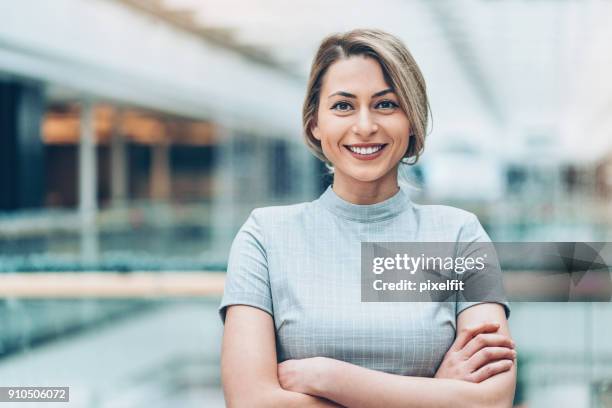 successful young businesswoman - hair back stock pictures, royalty-free photos & images