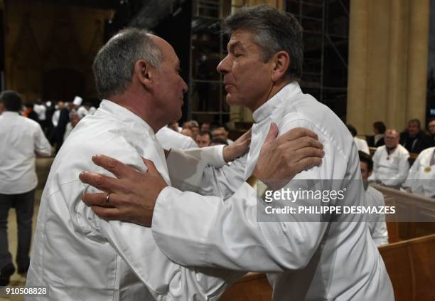 French chefs Marc Haeberlin and Regis Marcon arrive to attend the funeral ceremony for French chef Paul Bocuse at the Saint-Jean Cathedral in Lyon on...
