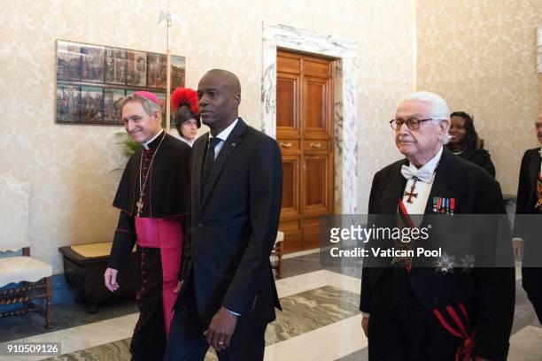 President of Haiti Jovenel Moise flanked by Prefect of the Pontifical House Georg Ganswein , arrives at the Apostolic Palace for a meeting with Pope...