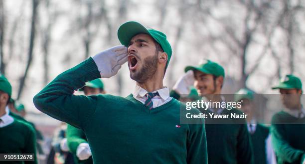 Kashmiri student shouts command at the Sher- i- Kashmir stadium, where the authorities held the main function during India's Republic Day...