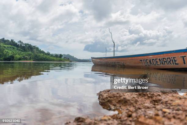 boat at the brokopondo lake in suriname - broer stock pictures, royalty-free photos & images