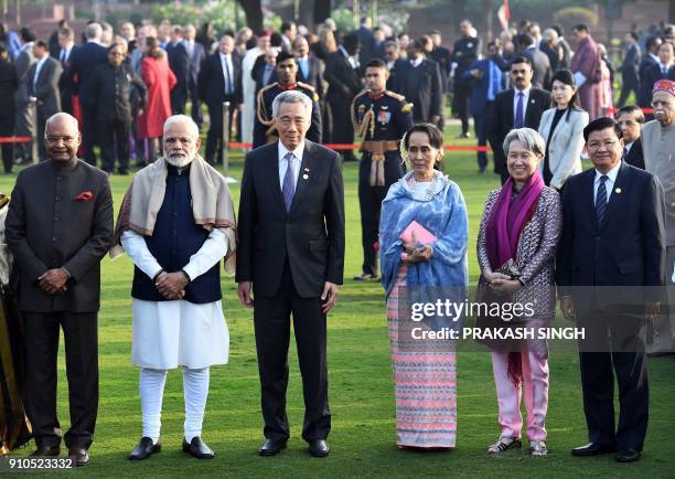 Indian Prime Minister Narendra Modi and Indian President Ram Nath Kovind pose with Prime Minister of Laos Thongloun Sisoulith , Myanmar's civilian...