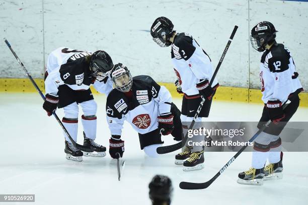 Shoko Ono of Japan is injured during the Women's Ice Hockey International Friendly match between Japan v Germany on January 26, 2018 in Tokyo, Japan.