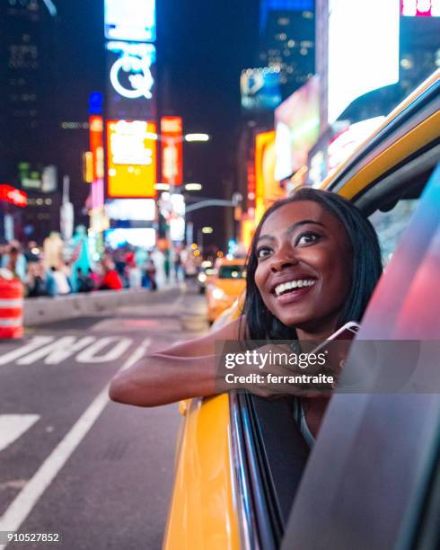 taxi ride in new york city - manhattan theater district stock pictures, royalty-free photos & images