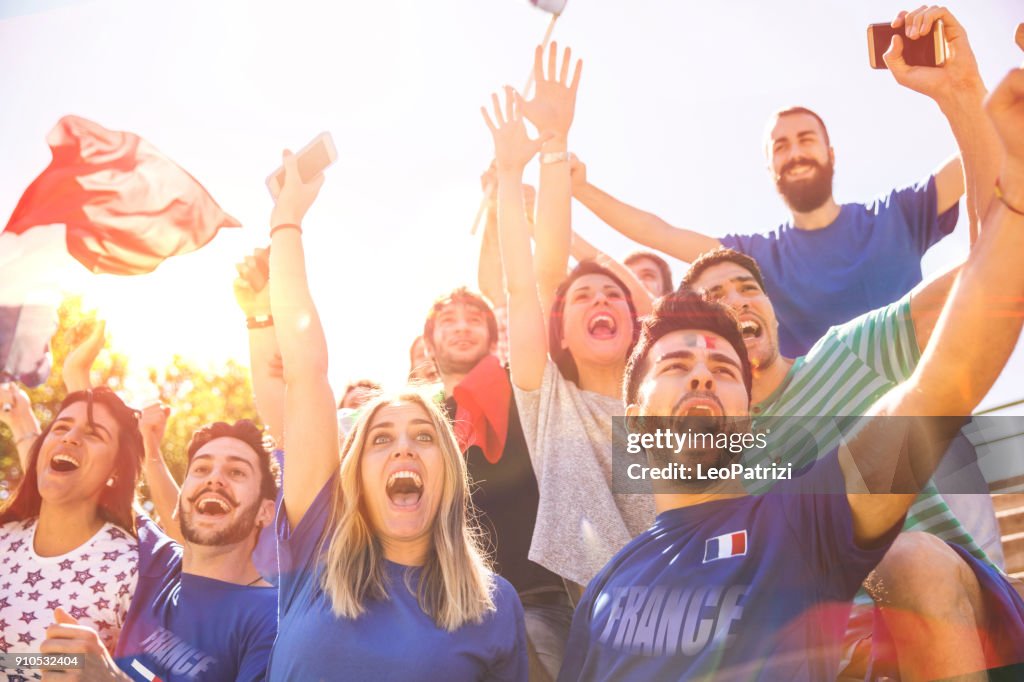 French supporters at the football league supporting their National Team