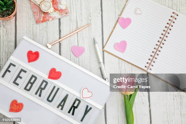 february written in a lightbox - febrero fotografías e imágenes de stock