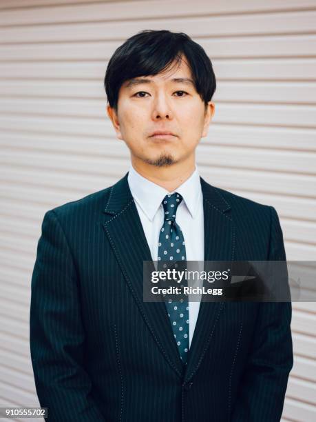 japanese businessman portrait - male portrait suit and tie 40 year old stock pictures, royalty-free photos & images