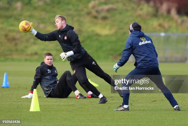 Keeper Jason Steele goes through his warm up watched by Robin Ruiter during a Sunderland AFC training session at The Academy of Light on January 26,...