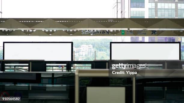mrt station, kuala lumpur, malaysia - electronic billboard stock pictures, royalty-free photos & images