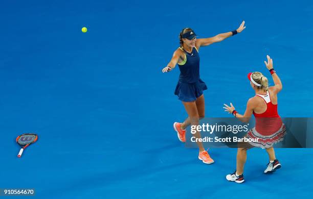 Kristina Mladenovic of France and Timea Babos of Hungary celebrate after winning the women's doubles final against Ekaterina Makarova of Russia and...