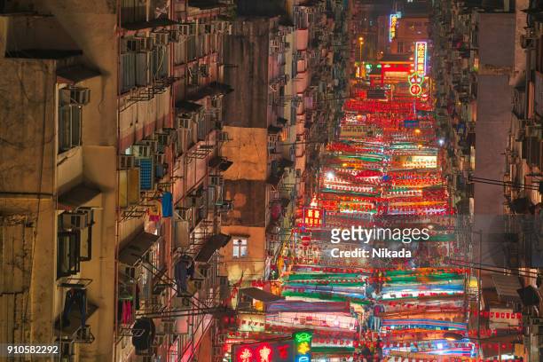 high angle view overlooking the temple street night market, hong kong - local high street stock pictures, royalty-free photos & images