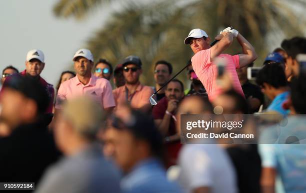 Rory McIlroy of Northern Ireland hits his tee shot on the 9th hole during round two of the Omega Dubai Desert Classic at Emirates Golf Club on...