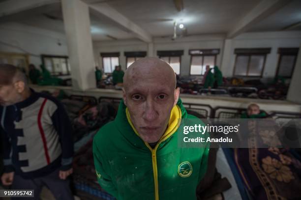 Patient of a psychiatric hospital, damaged in an artillery shooting by PYD/PKK terror groups in Afrin a week ago, is seen in Azez region of Aleppo,...