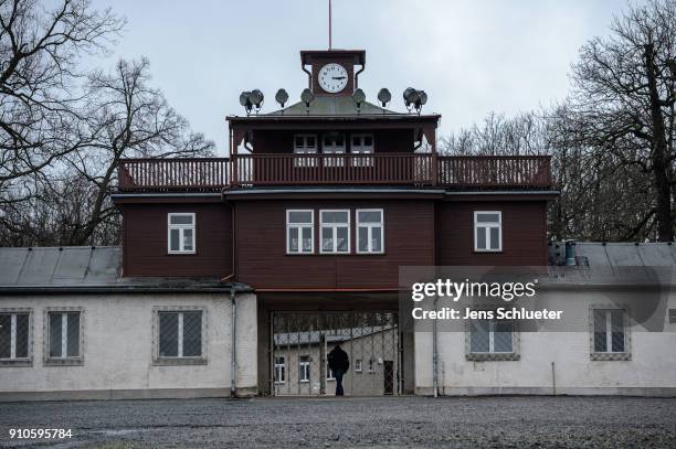 Man walks in front of the former main entrance to the Buchenwald concentration camp on January 26, 2018 near Weimar, Germany. International Holocaust...