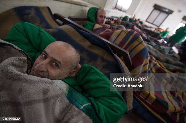 Patients of a psychiatric hospital, damaged in an artillery shooting by PYD/PKK terror groups in Afrin a week ago, are seen in Azez region of Aleppo,...