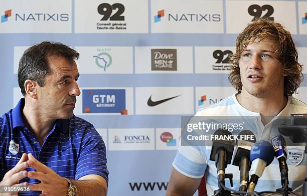 Francois Steyn of South-Africa gives a press conference beside French Top 14 rugby union club Racing-Metro coach Pierre Berbizier after a training...