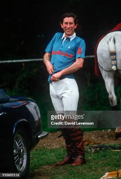 Prince Charles is seen dressing into his Polo outfit prior to a Polo match on May 18, 1986 at Cowdray Park in West Sussex.