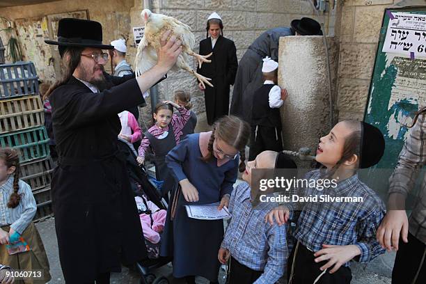 Kaparot Ritual Kaparot Ceremony Performed In Israel Photos and Premium High Res ...