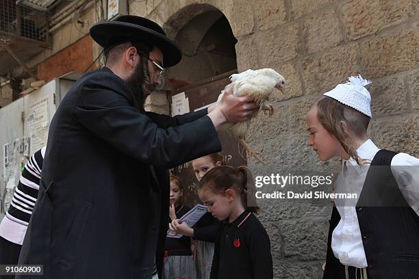 Kaparot Ritual Kaparot Ceremony Performed In Israel Photos and Premium High Res ...