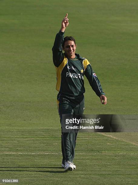Saeed Ajmal of Pakistan celebrates the wicket of Darren Sammy of West Indies during the ICC Champions Trophy Group A match between Pakistan and West...