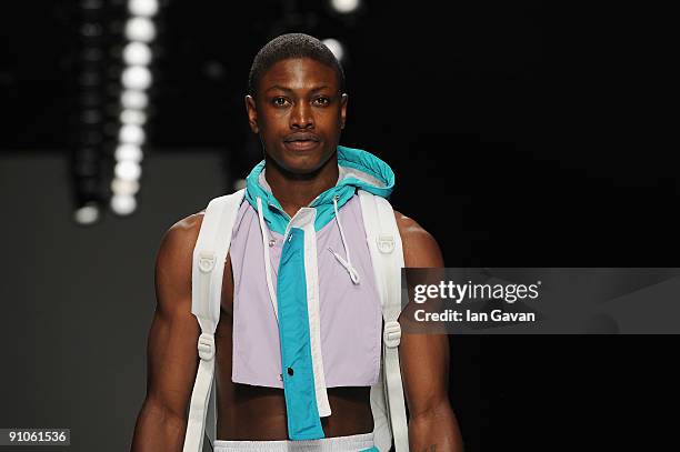 Model walks down the catwalk during the Christopher Shannon fashion show at the BFC tent, Somerset House, as part of 'Man' at London Fashion Week on...