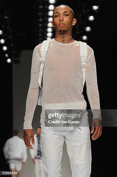 Model walks down the catwalk during the Christopher Shannon fashion show at the BFC tent, Somerset House, as part of 'Man' at London Fashion Week on...