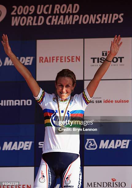 Kristin Armstrong of the USA celebrates with her gold medal after winning the Elite Women's Time Trial at the 2009 UCI Road World Championships on...