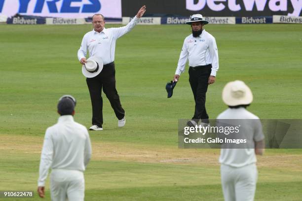 Umpire, Ian Gould sends the players off the field during day 3 of the 3rd Sunfoil Test match between South Africa and India at Bidvest Wanderers...