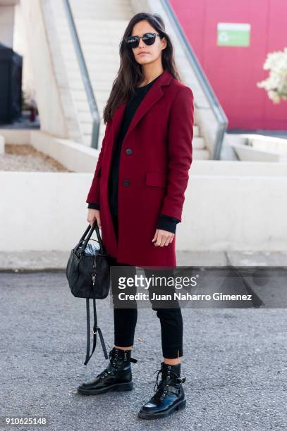 Model Begona Martin wears Pull & Bear boots, Zara trousers, Zara coat and All Saints Sweater during Mercedes Benz Fashion Week Madrid Autumn / Winter...