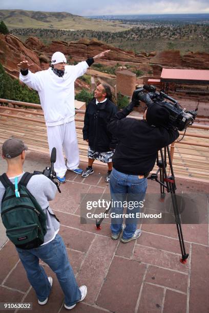 Chris Andersen of the Denver Nuggets and strength and conditioning coach Steve Hess conduct an interview following a work out on September 23, 2009...