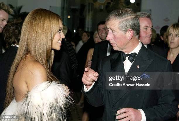 The Prince of Wales greets Beyonce as he attends 'Fashion Rocks' concert and fashion show in aid of the Princes Trust at the Royal Albert Hall on...