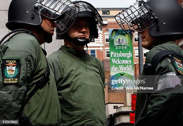 Members of the Allegheny County Police Department patrol the downtown area in advance of the G-20 Summit September 23, 2009 in Pittsburgh,...