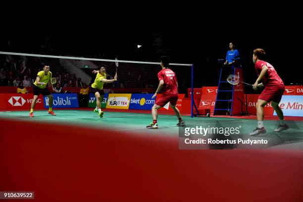 Marcus Fernaldi Gideon and Kevin Sanjaya Sukamuljo of Indonesia compete against Chen Hung Ling and Wang Chi Lin of Chinese Taipei during the Men's...