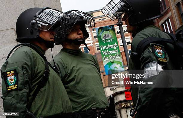 Members of the Allegheny County Police Department patrol the downtown area in advance of the G-20 Summit September 23, 2009 in Pittsburgh,...